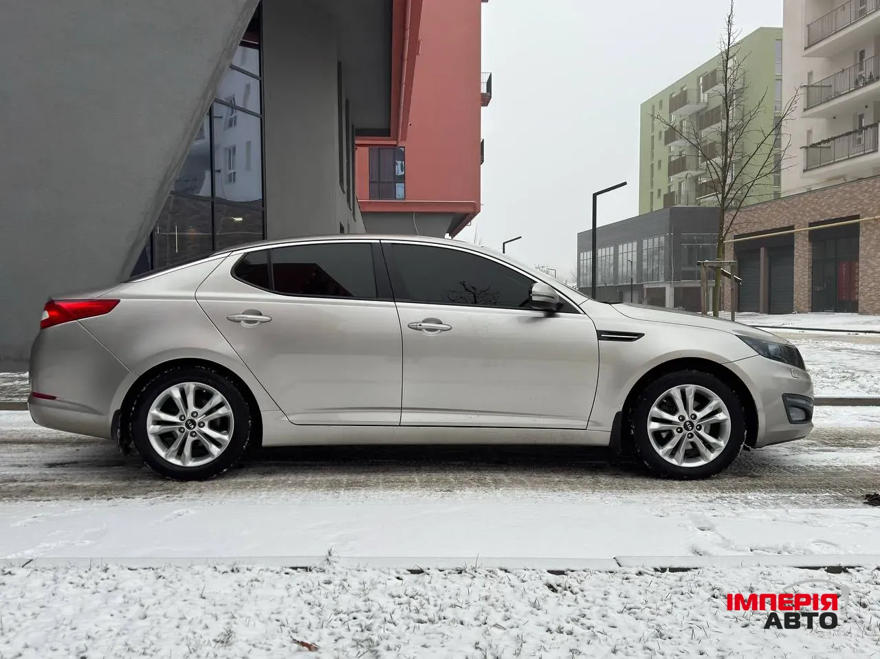 Kia Optima - фото 7