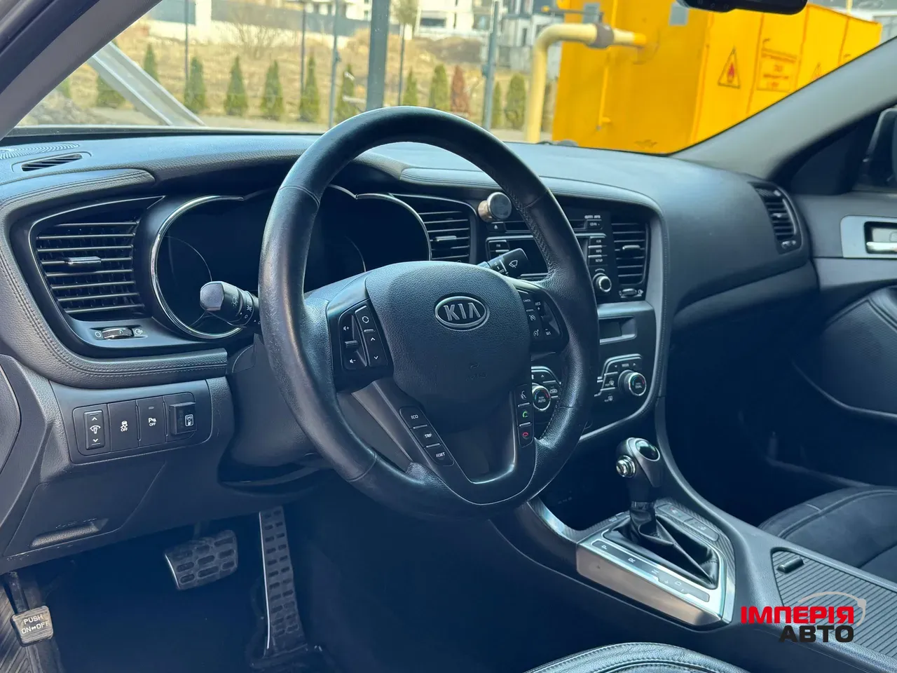 Kia Optima - фото 9