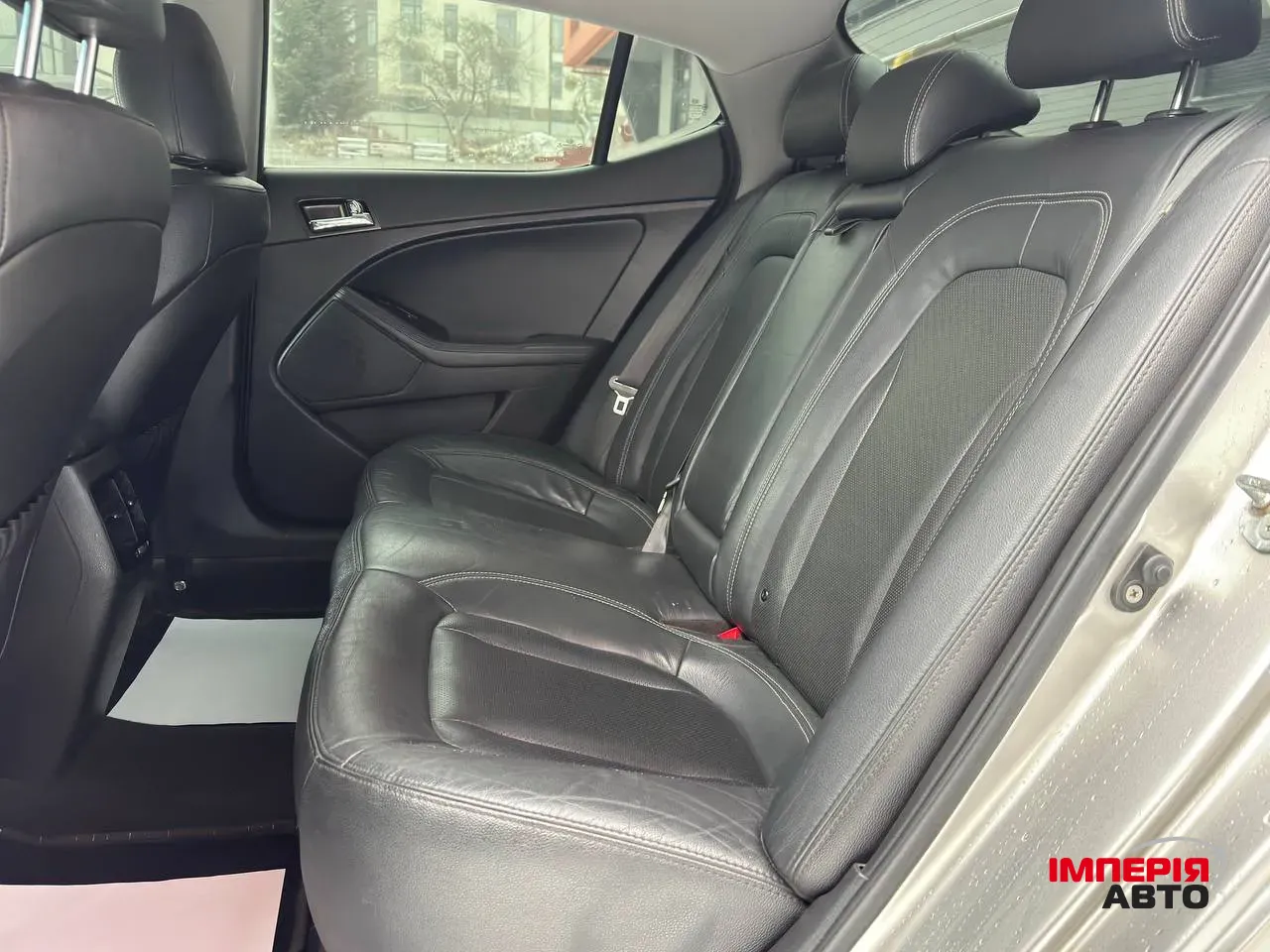 Kia Optima - фото 14