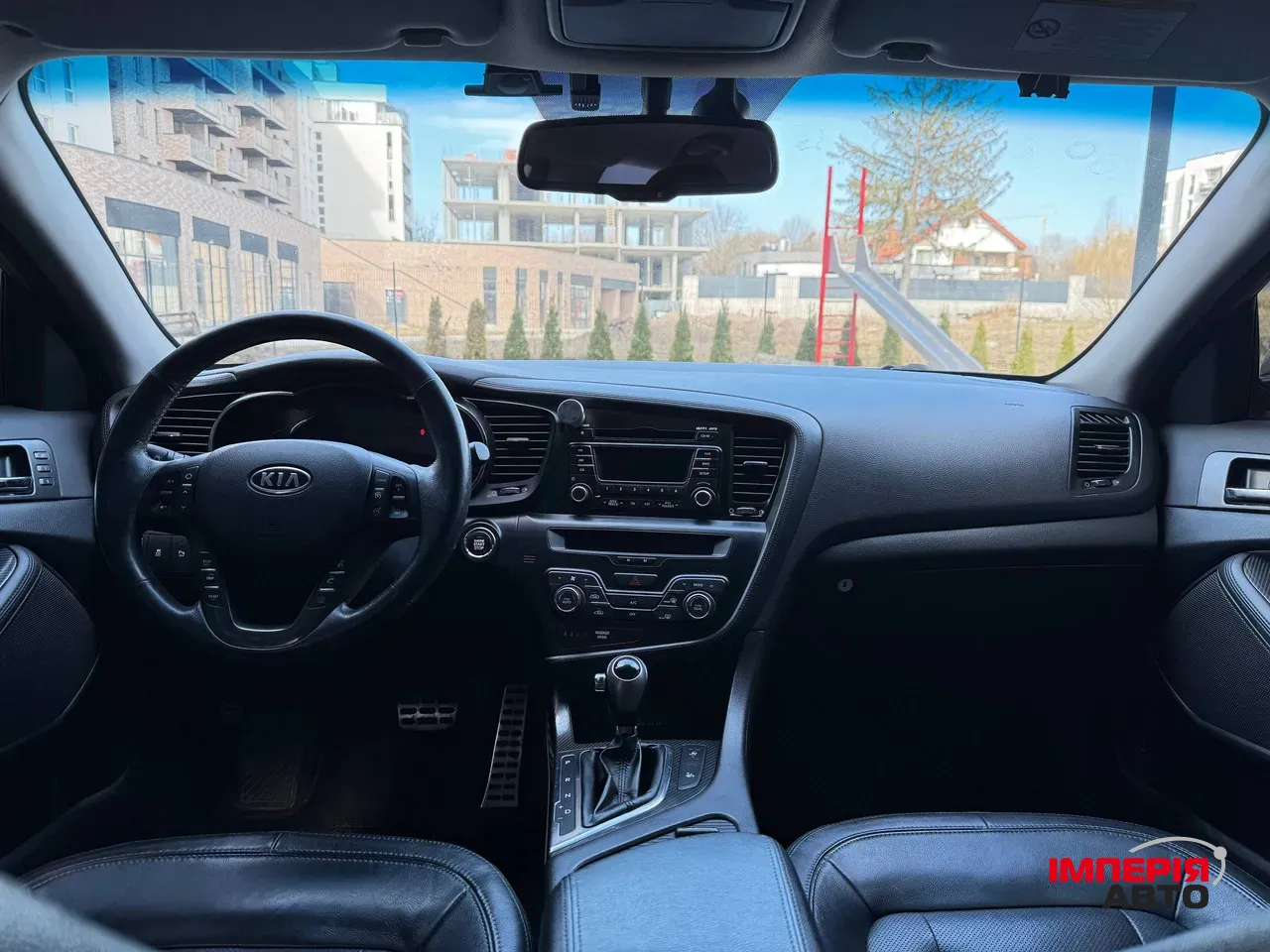 Kia Optima - фото 17
