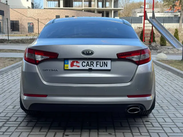 Kia Optima - фото 5