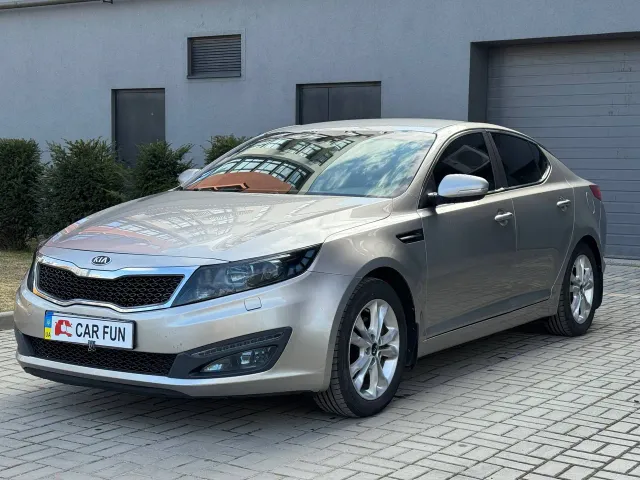 Kia Optima - фото 1