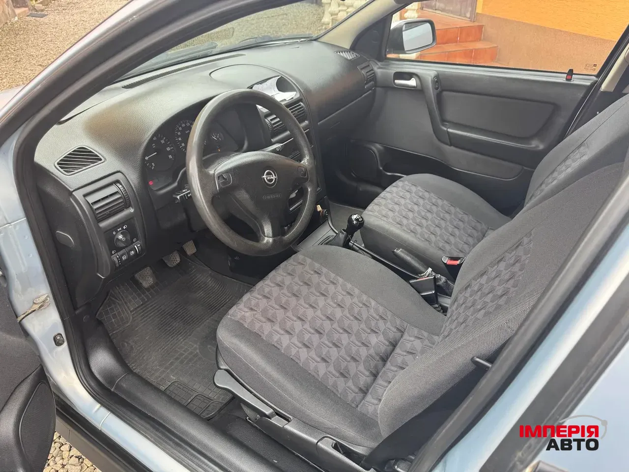 Opel Astra - фото 7