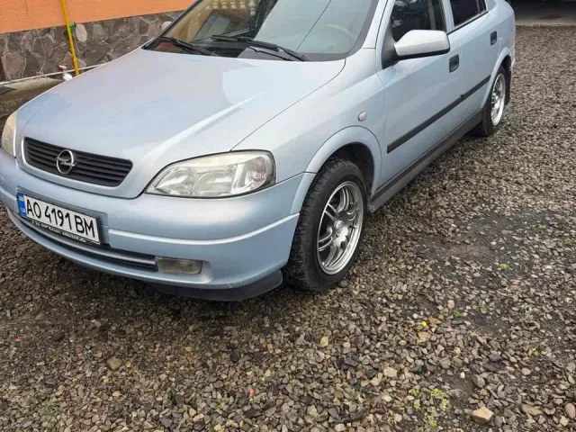 Opel Astra - фото 1