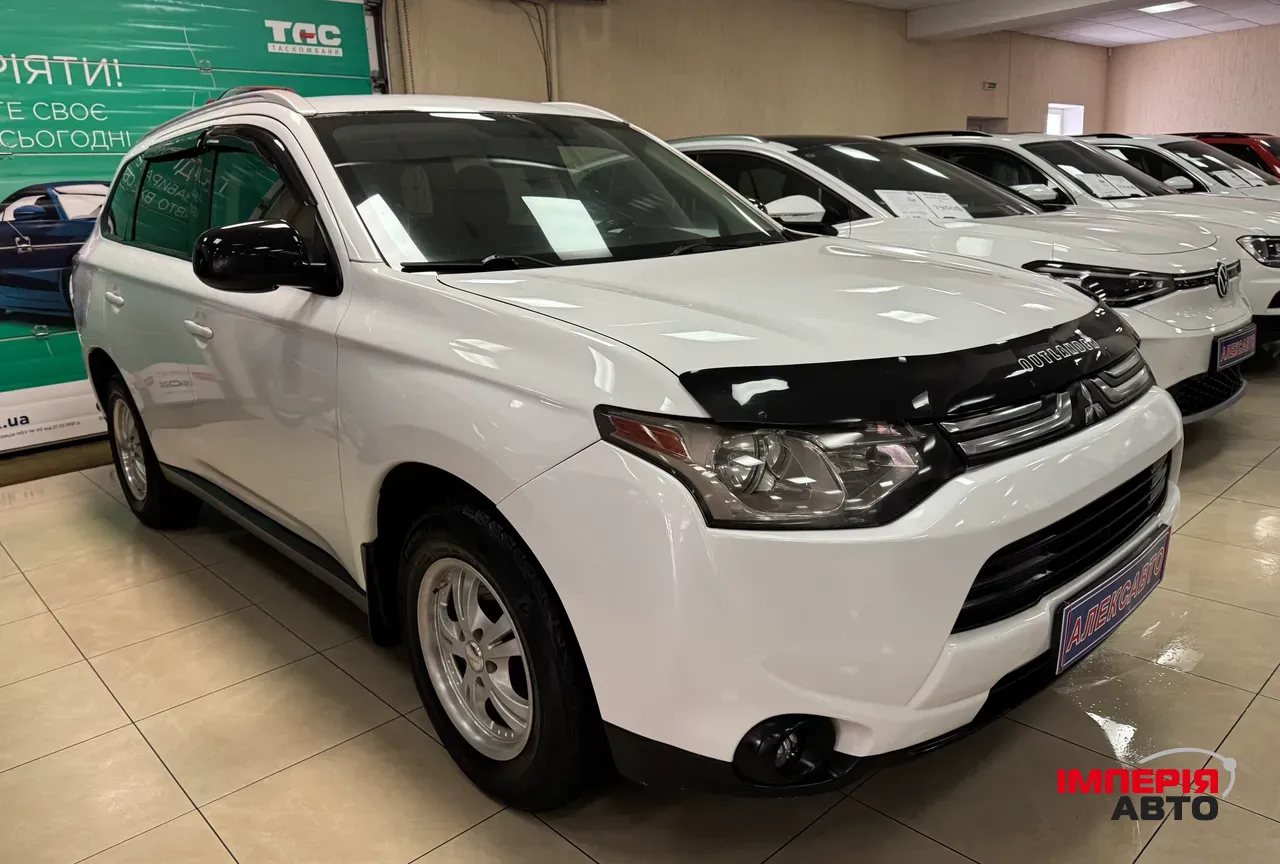 Mitsubishi Outlander - фото 1