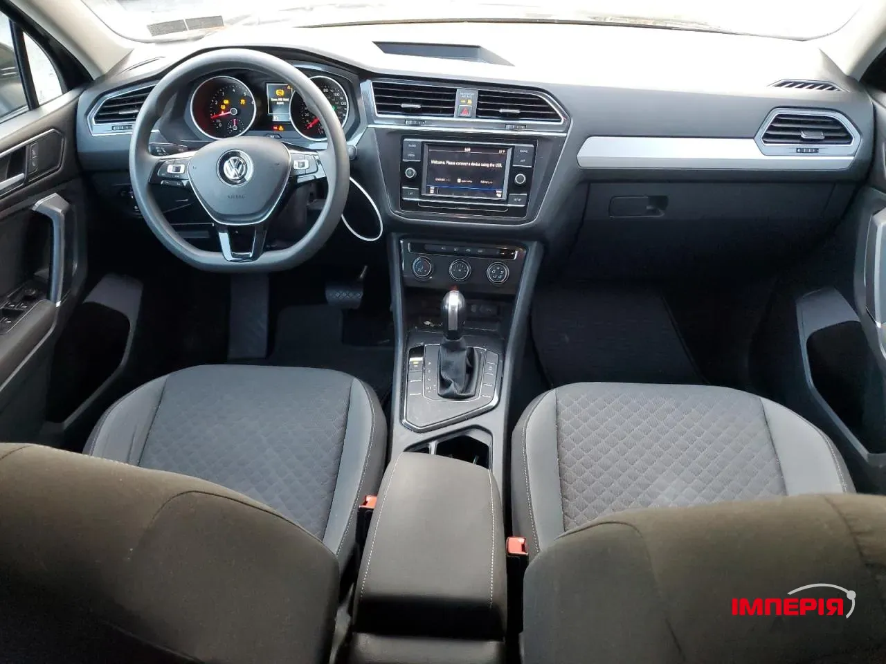 Volkswagen Tiguan - фото 6