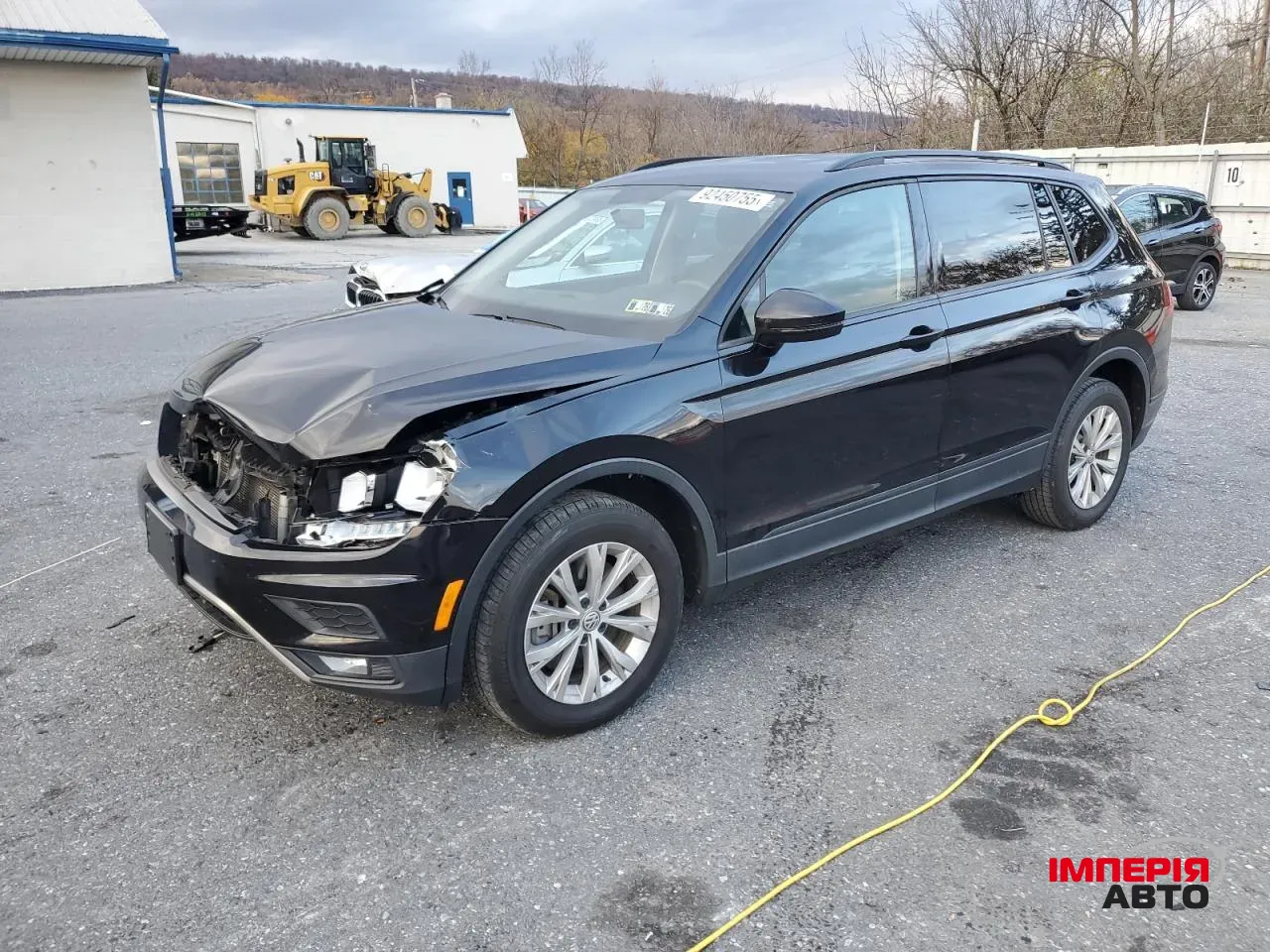 Volkswagen Tiguan - фото 1