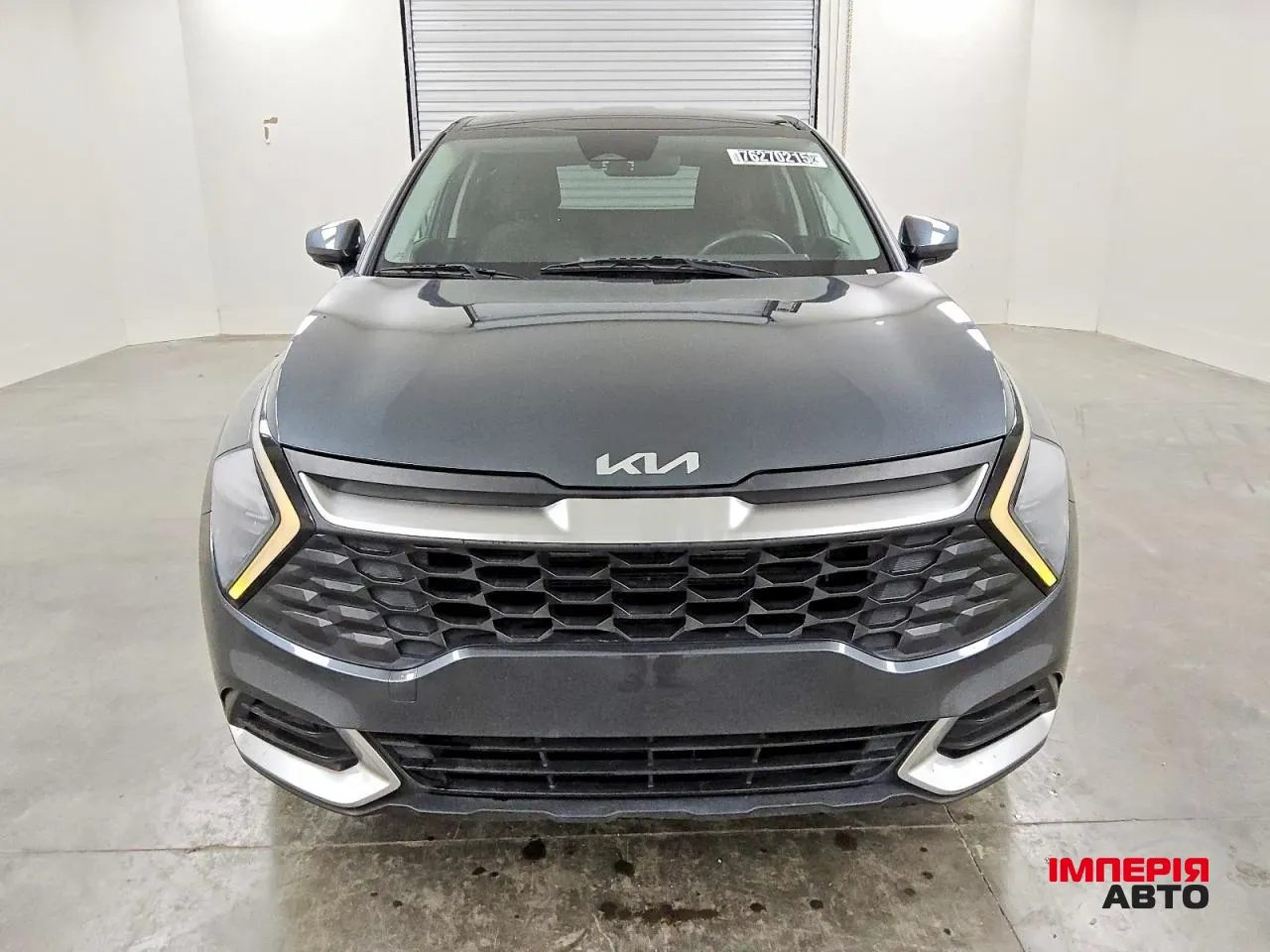 Kia Sportage - фото 1