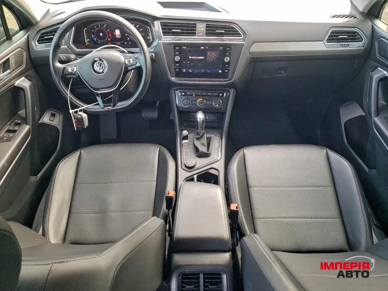 Volkswagen Tiguan - фото 6