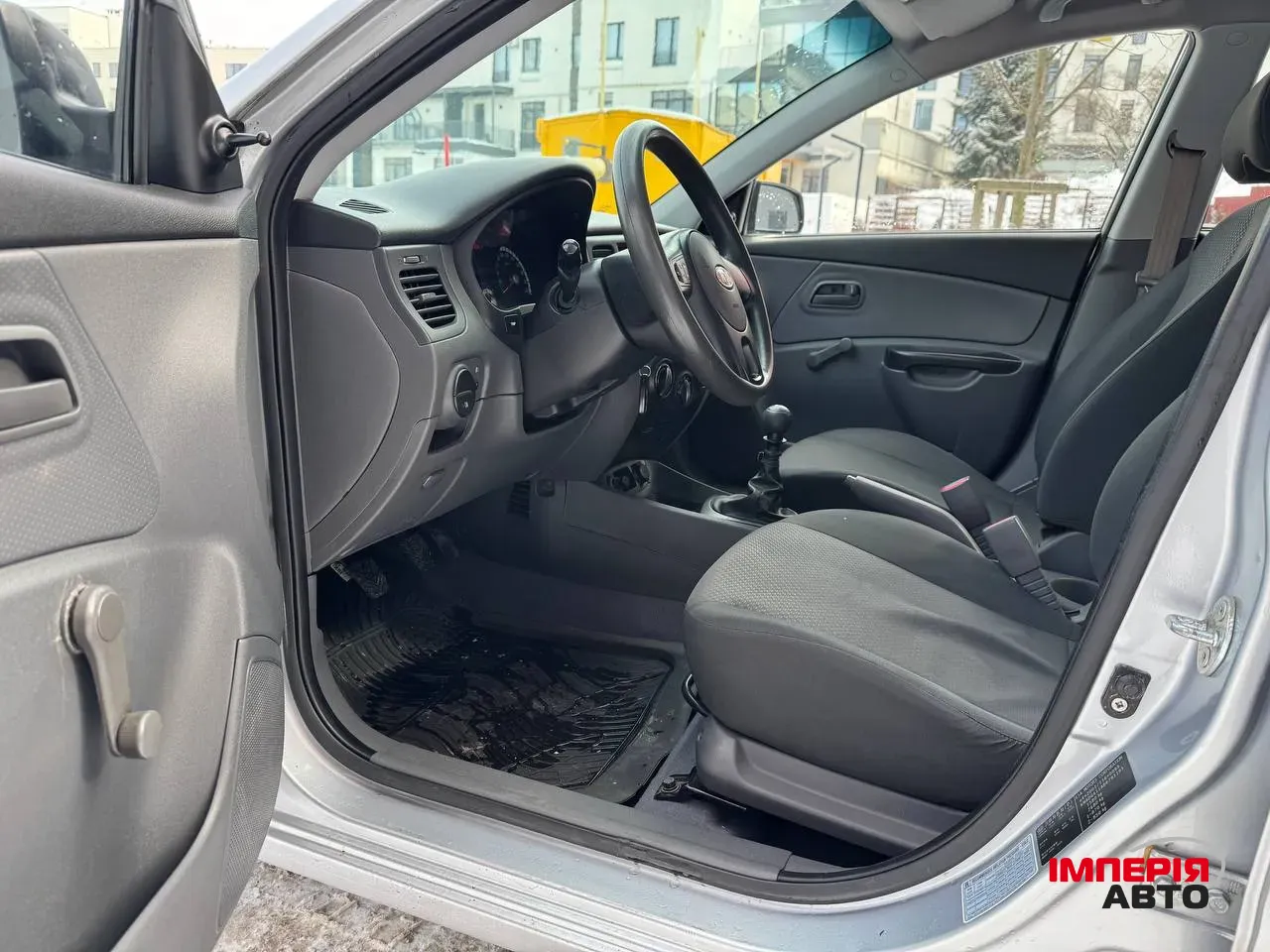 Kia Rio - фото 11