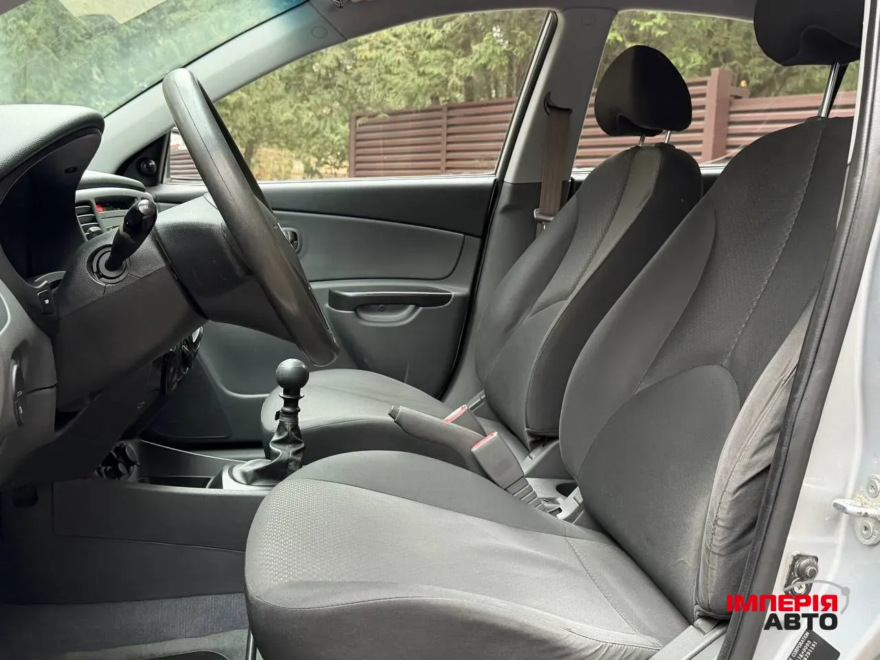 Kia Rio - фото 11