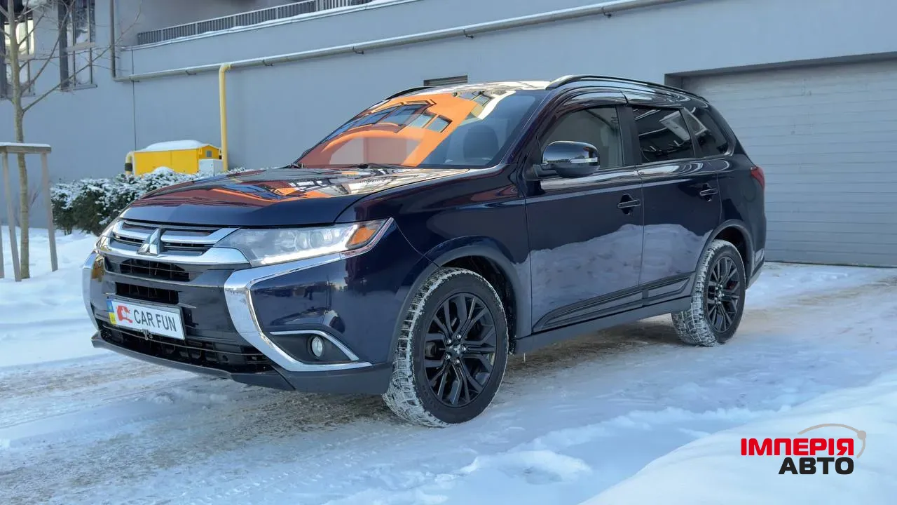 Mitsubishi Outlander - фото 1