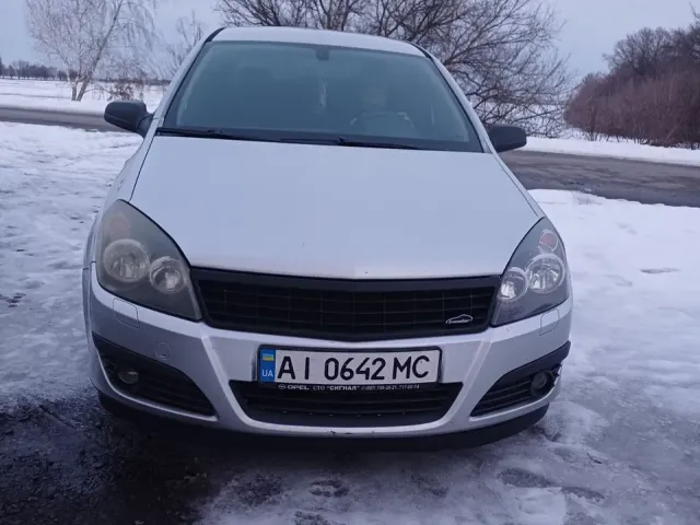 Opel Astra - фото 1