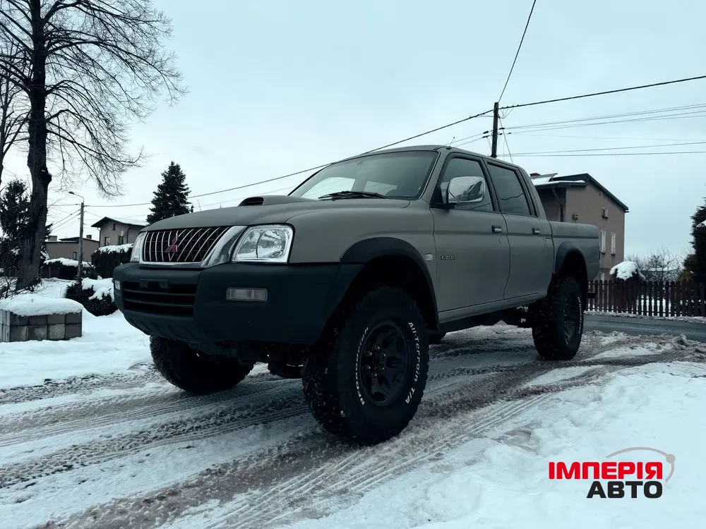Mitsubishi L200 - фото 1