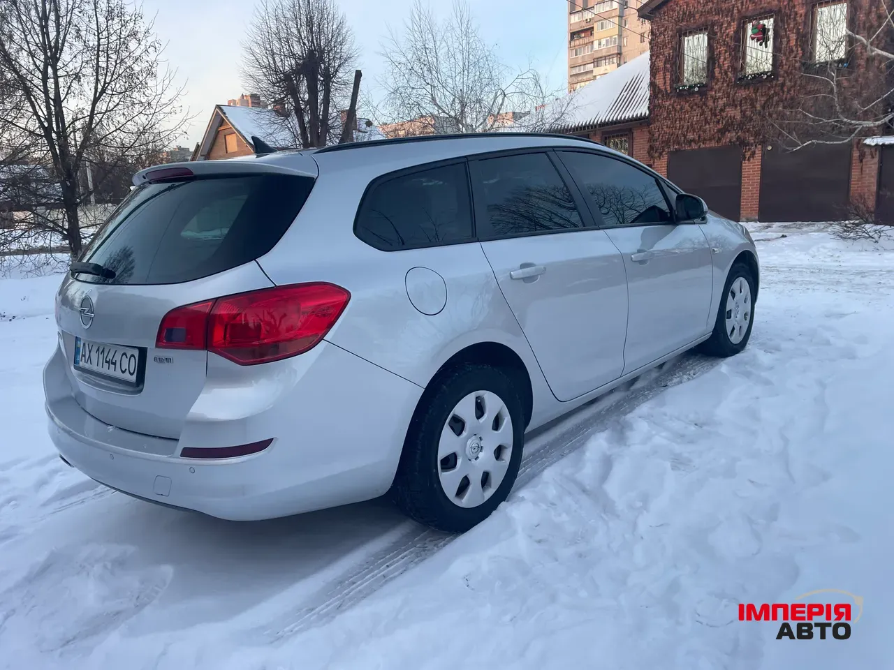 Opel Astra - фото 1