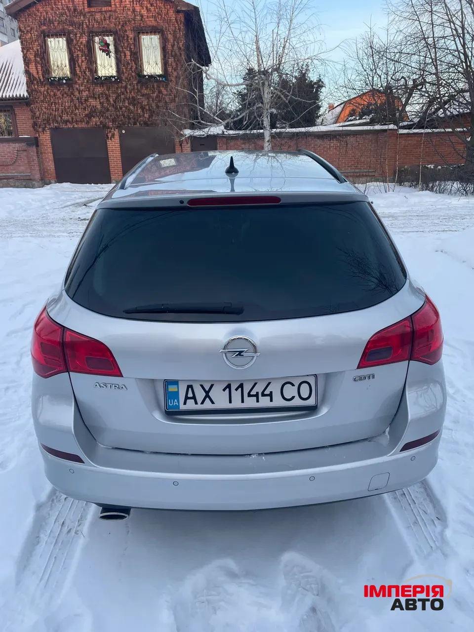 Opel Astra - фото 12
