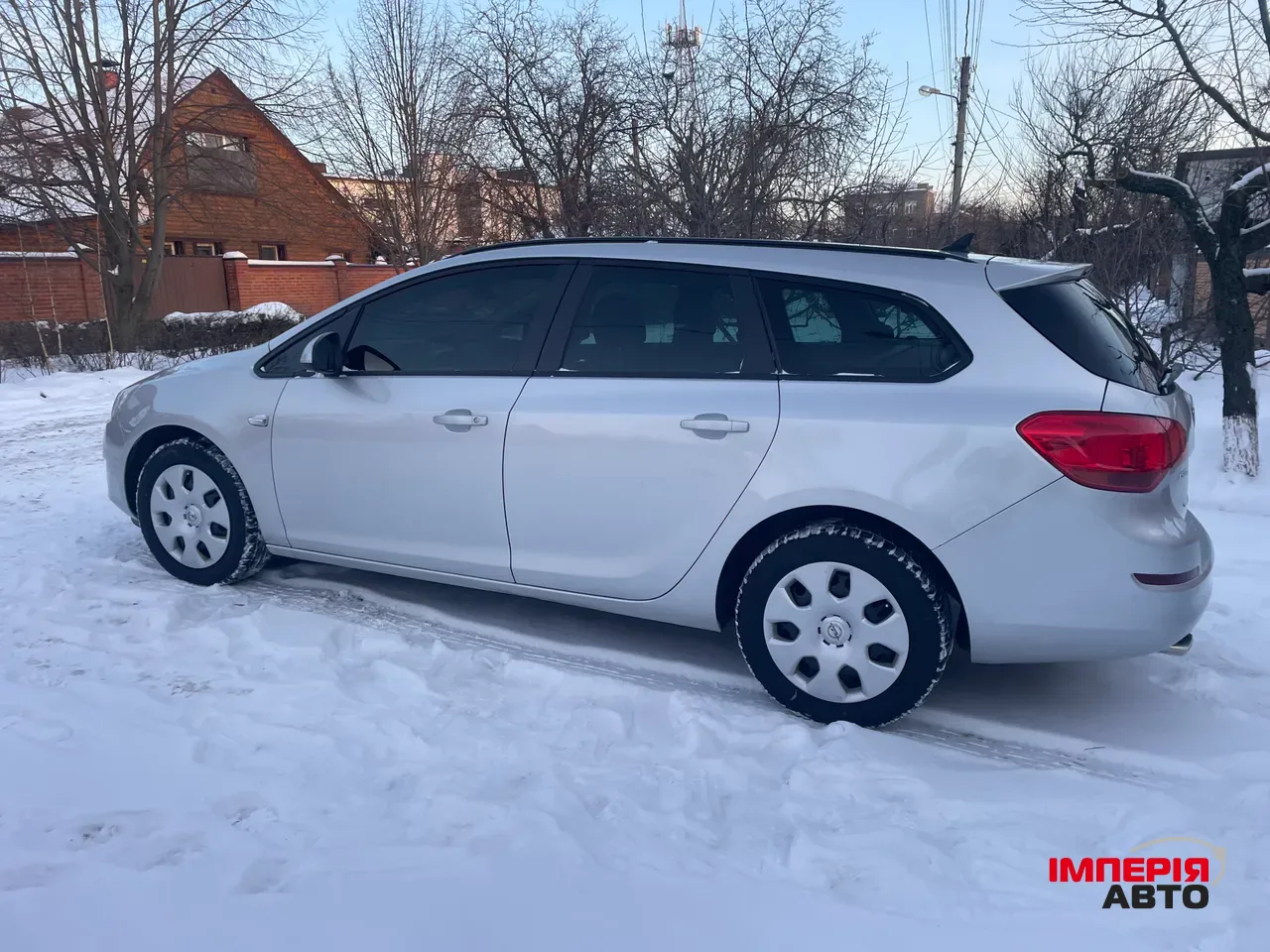 Opel Astra - фото 11