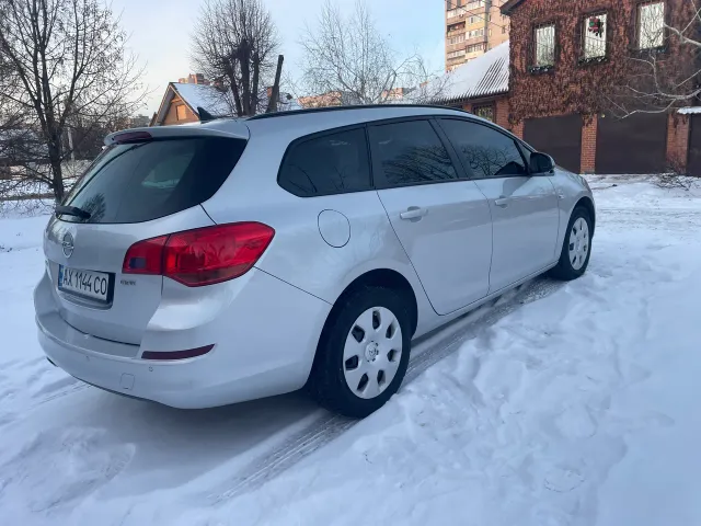 Opel Astra - фото 1