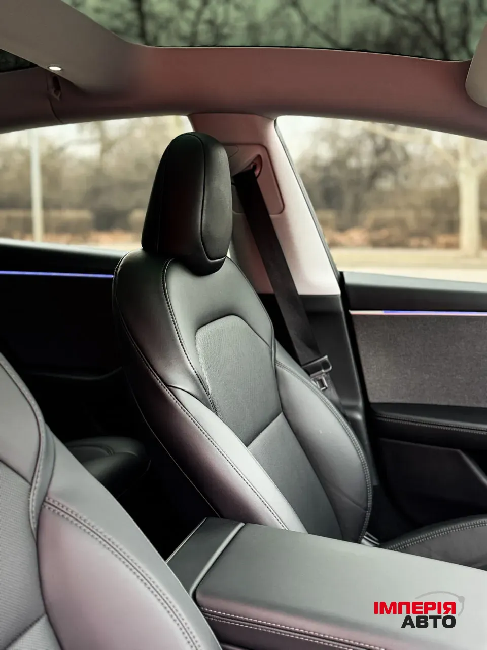 Tesla Model 3 - фото 12