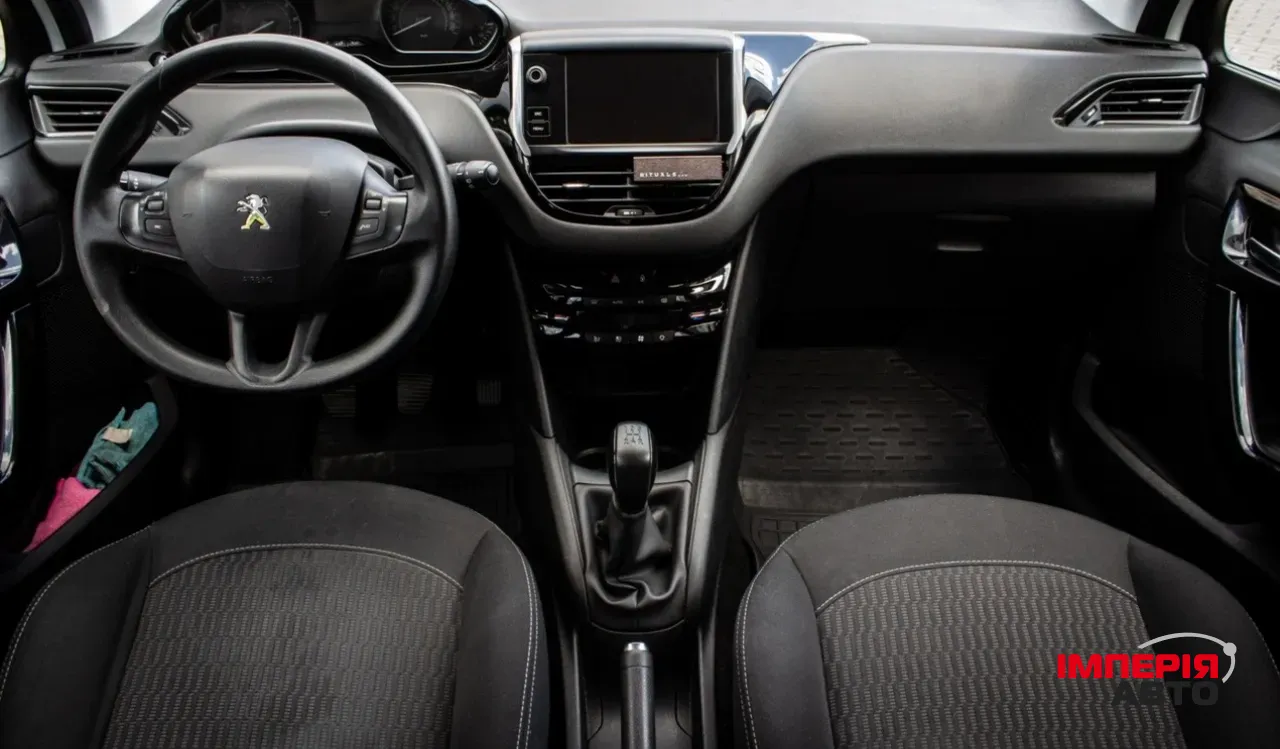Peugeot 208 - фото 9