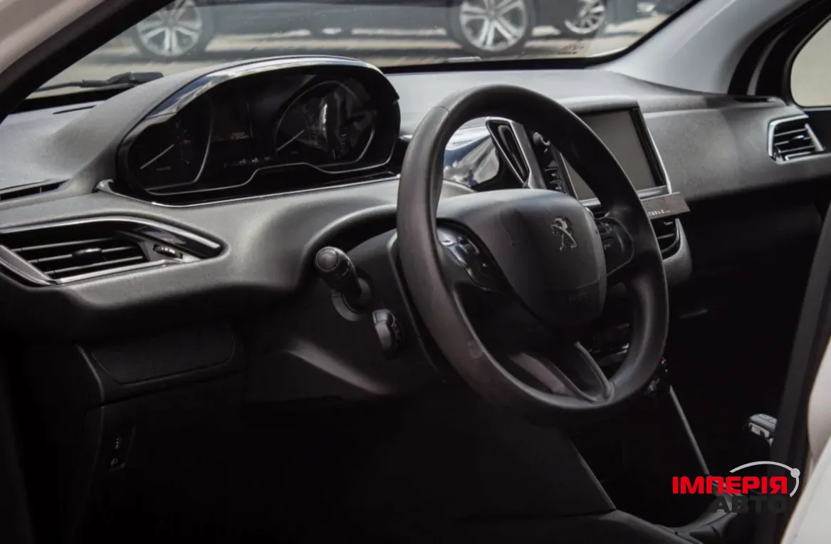 Peugeot 208 - фото 7