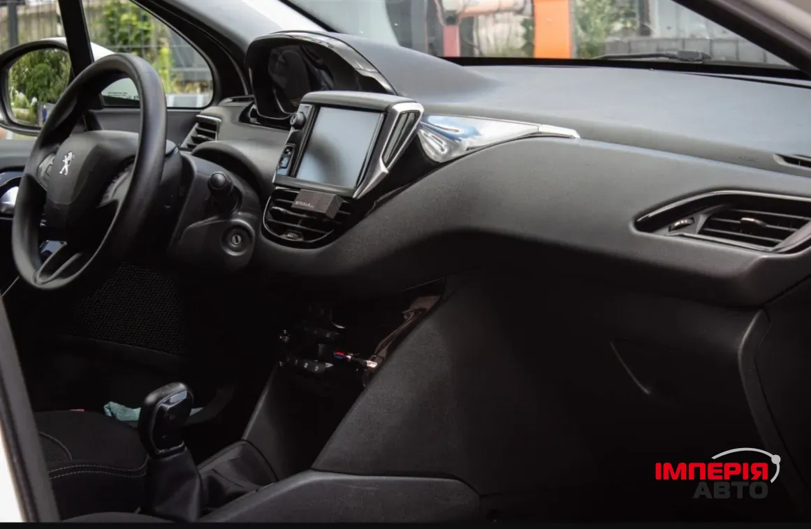 Peugeot 208 - фото 6