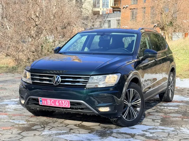 Volkswagen Tiguan - фото 1