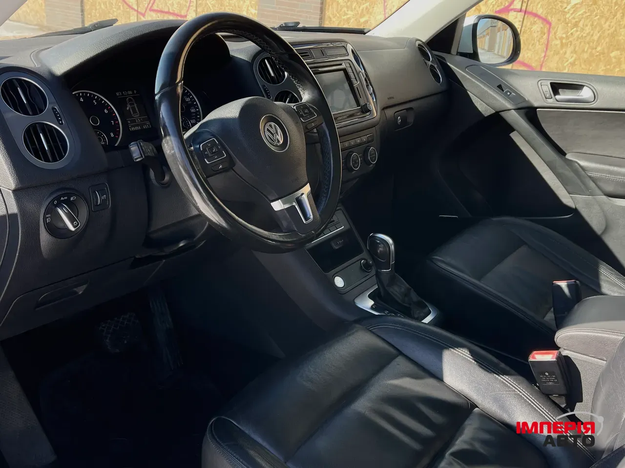 Volkswagen Tiguan - фото 12