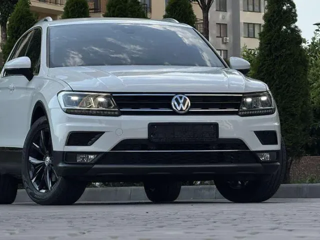 Volkswagen Tiguan - фото 1