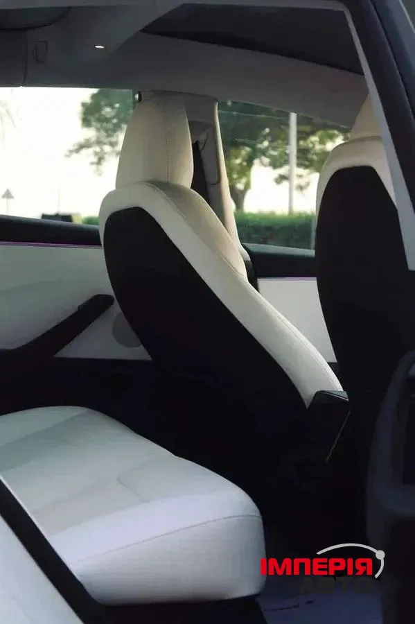 Tesla Model 3 - фото 8