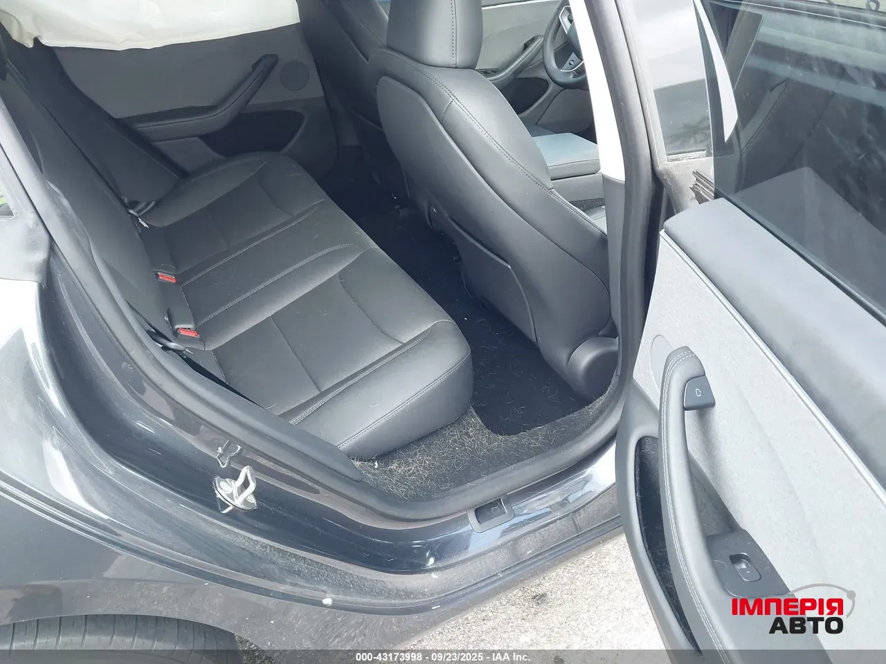 Tesla Model 3 - фото 9