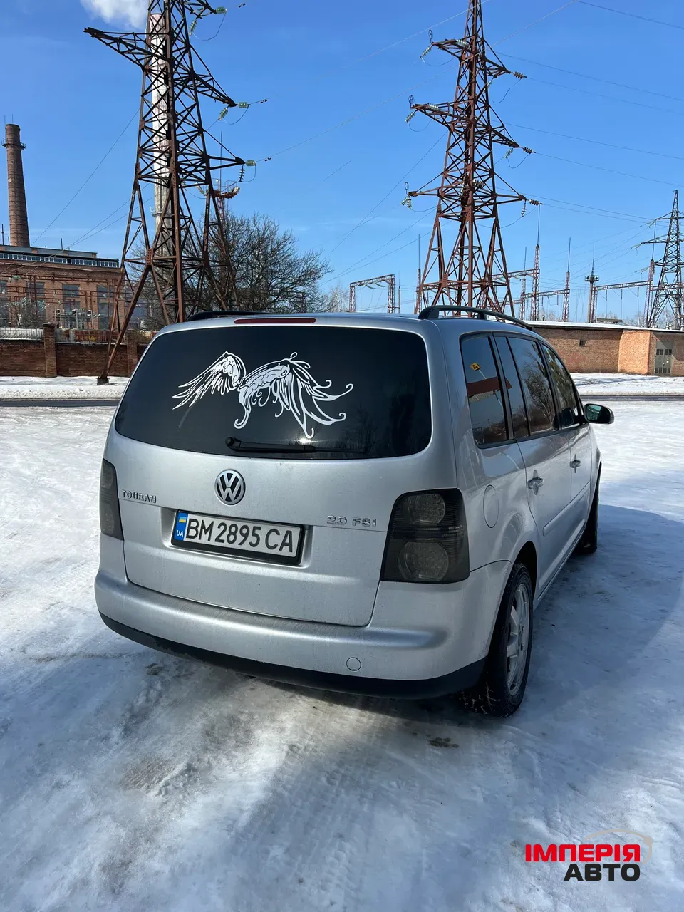 Volkswagen Touran - фото 4