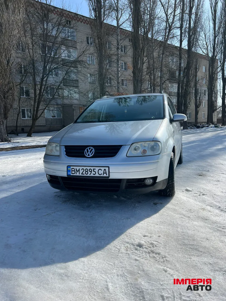 Volkswagen Touran - фото 1