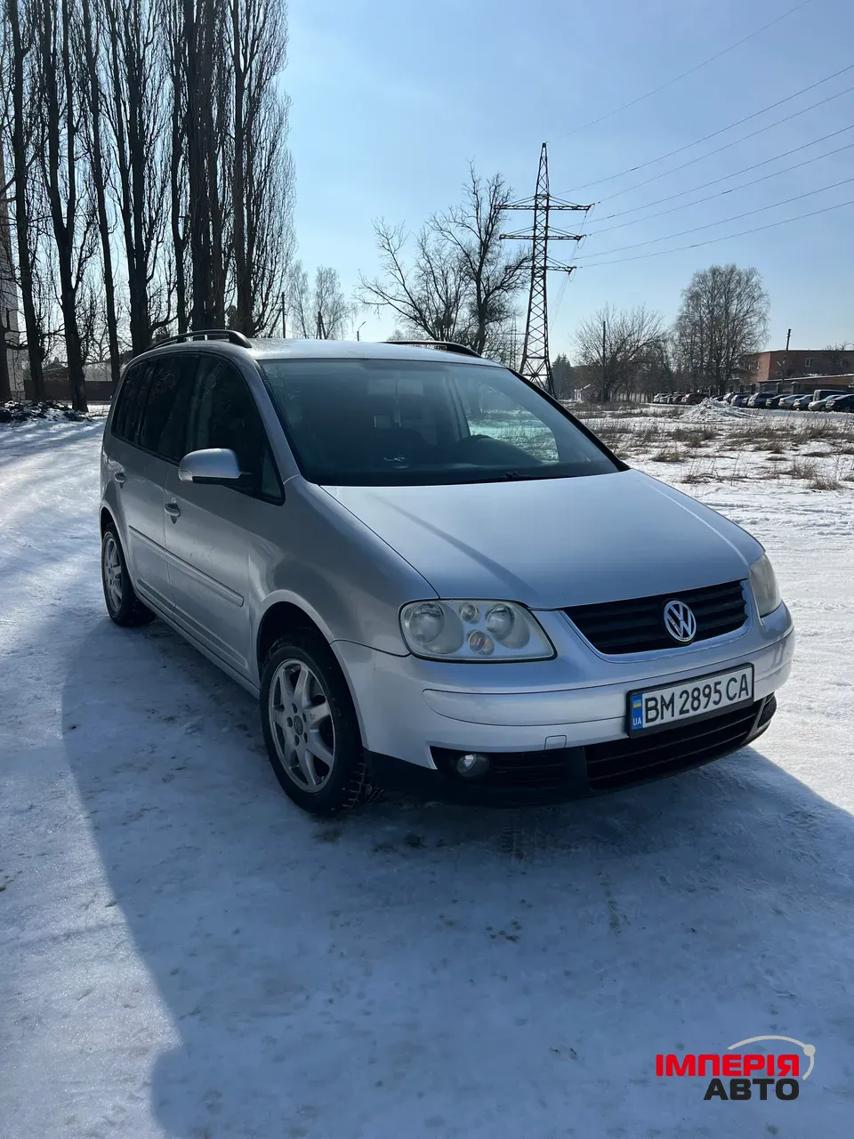 Volkswagen Touran - фото 2