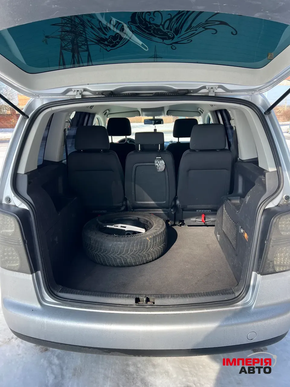 Volkswagen Touran - фото 11