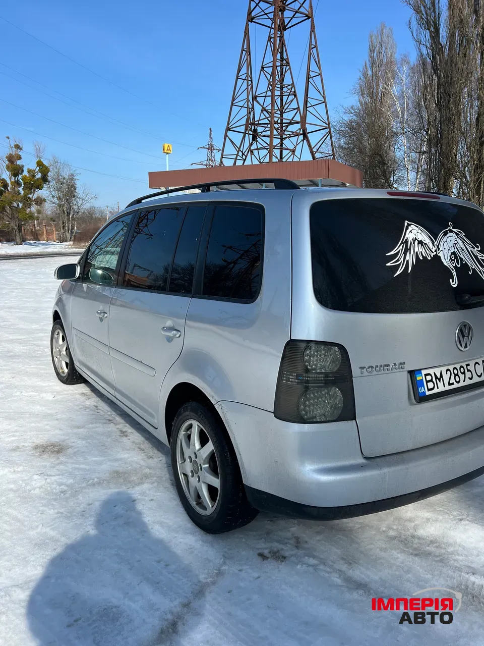 Volkswagen Touran - фото 5