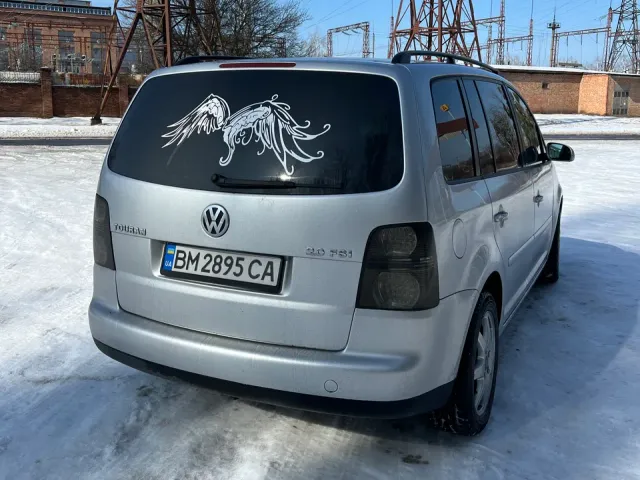 Volkswagen Touran - фото 4