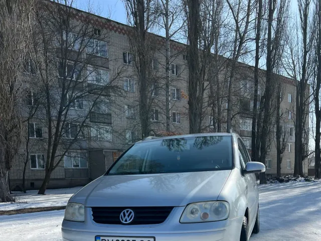 Volkswagen Touran - фото 1
