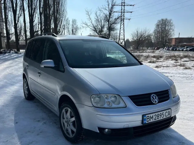 Volkswagen Touran - фото 2