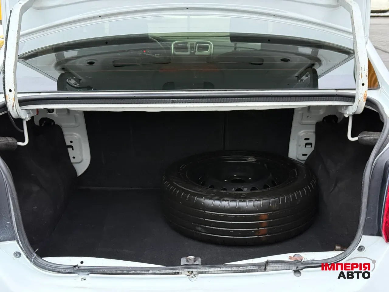 Renault Logan - фото 12