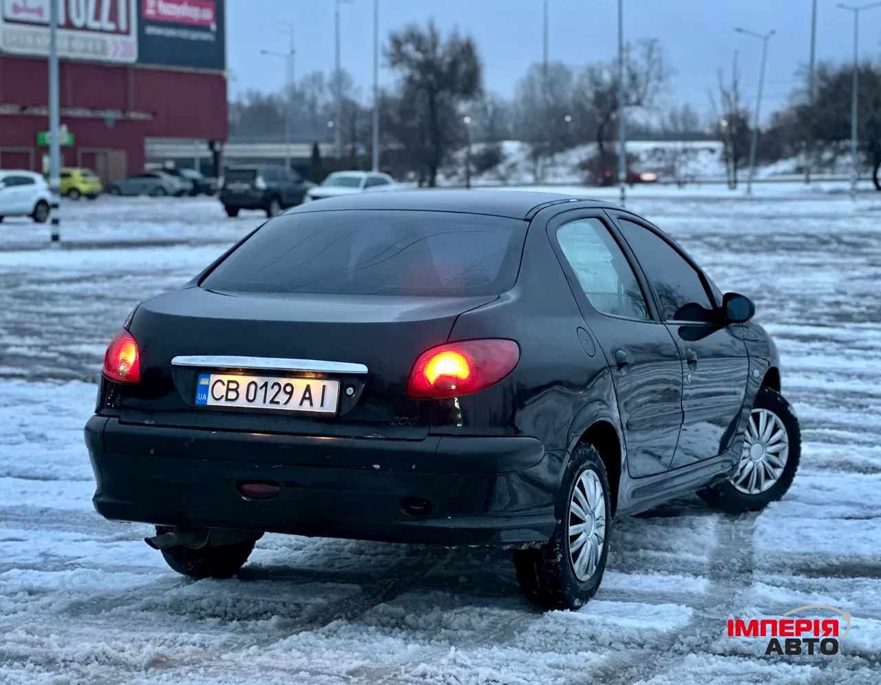 Peugeot 206 - фото 7