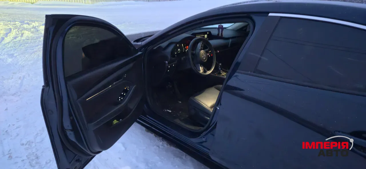 Mazda 3 - фото 7