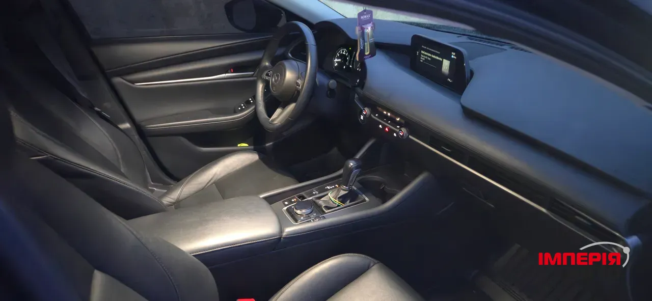 Mazda 3 - фото 11