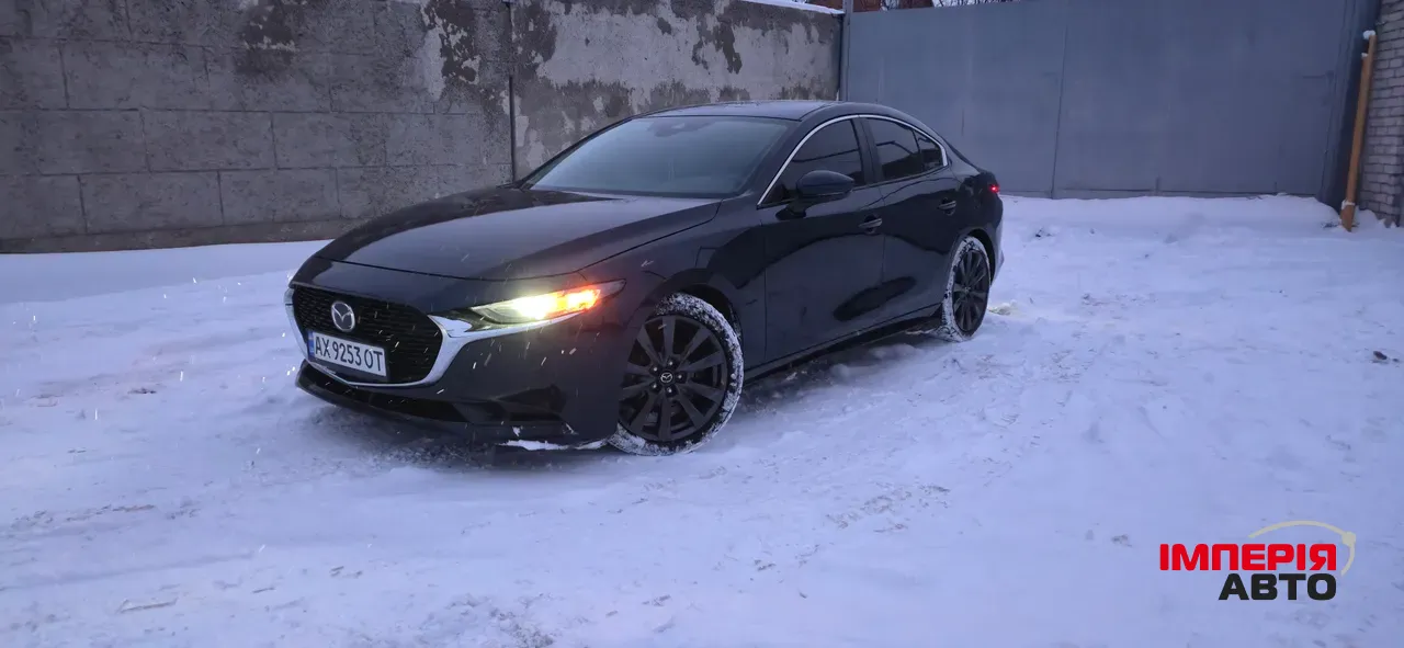 Mazda 3 - фото 3