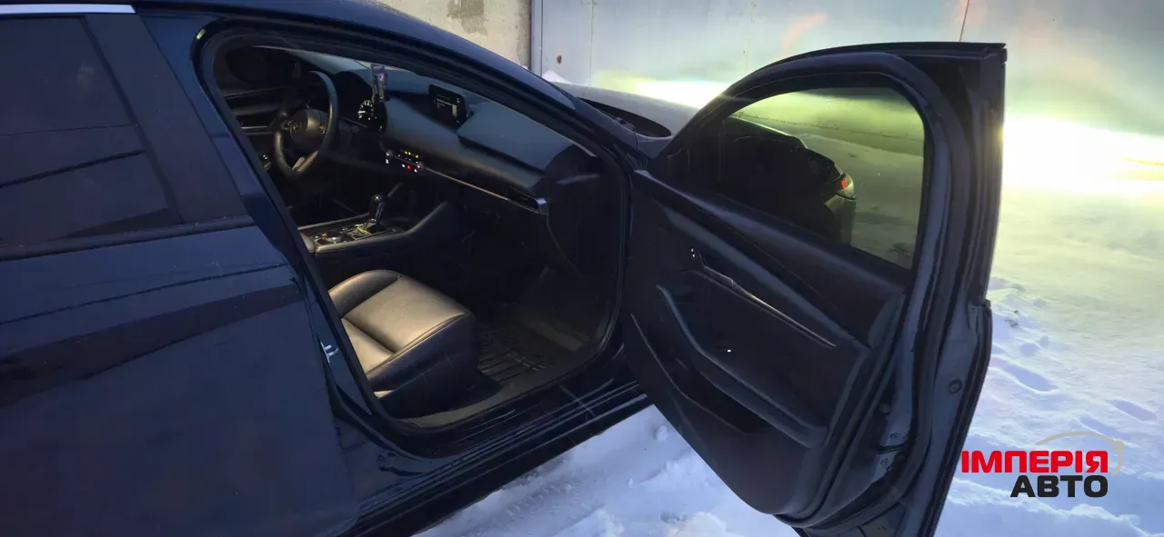 Mazda 3 - фото 12