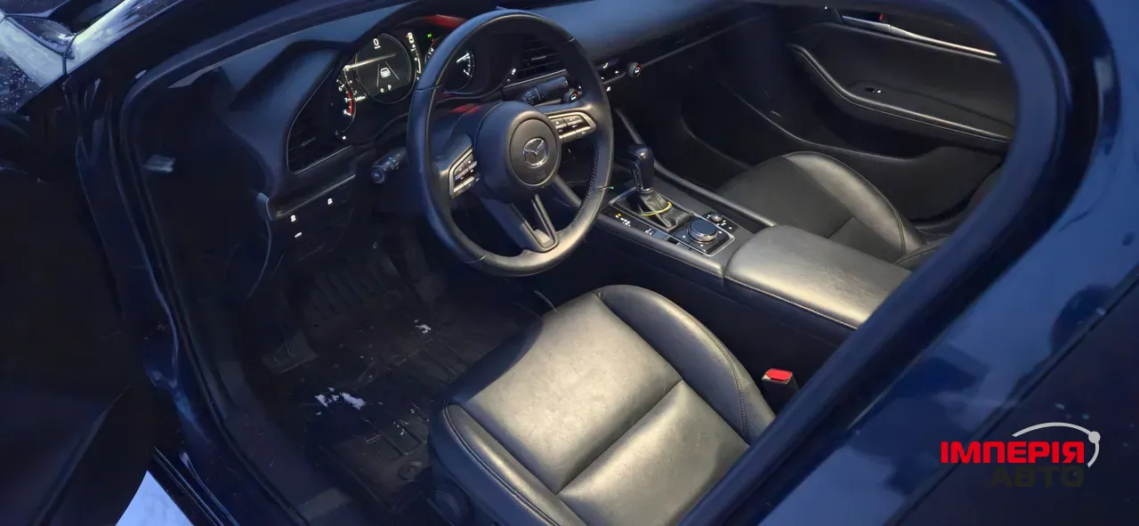 Mazda 3 - фото 8