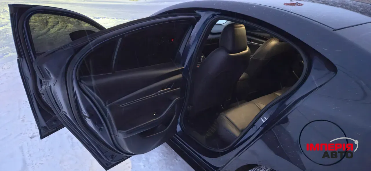 Mazda 3 - фото 9