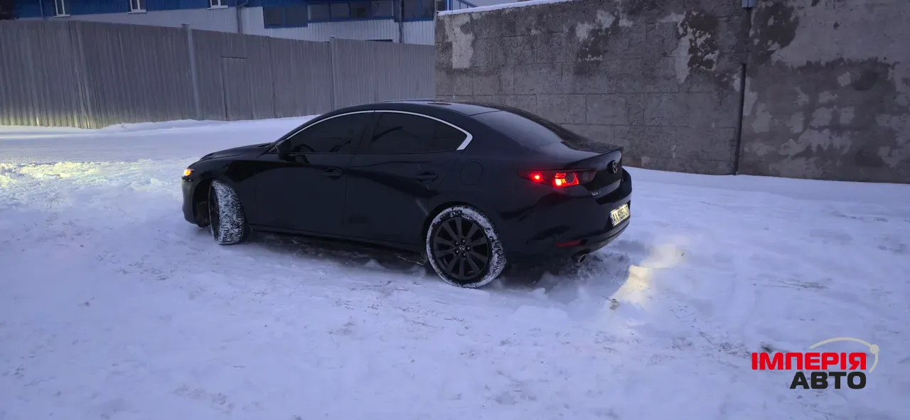 Mazda 3 - фото 4