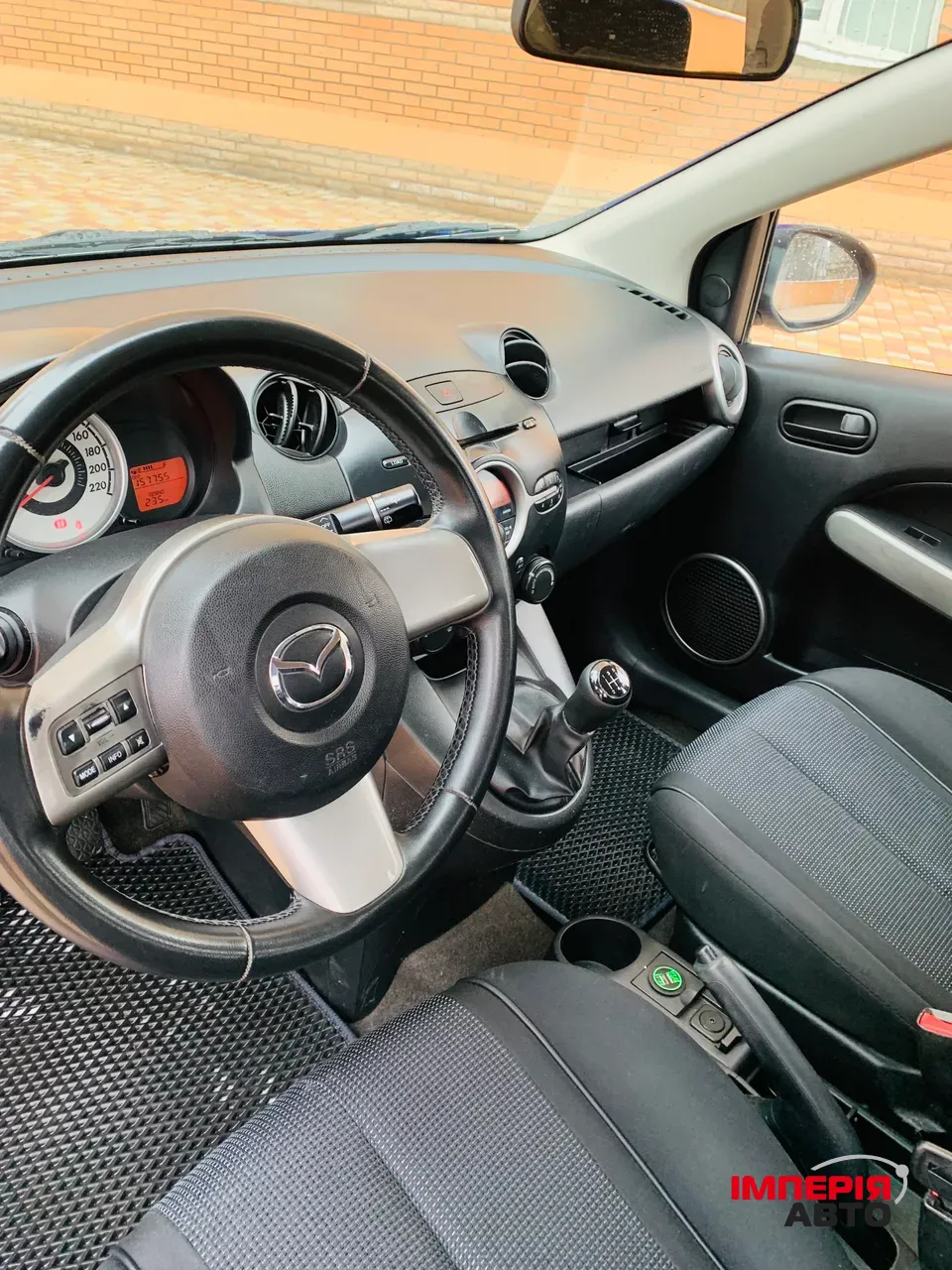 Mazda 2 - фото 7