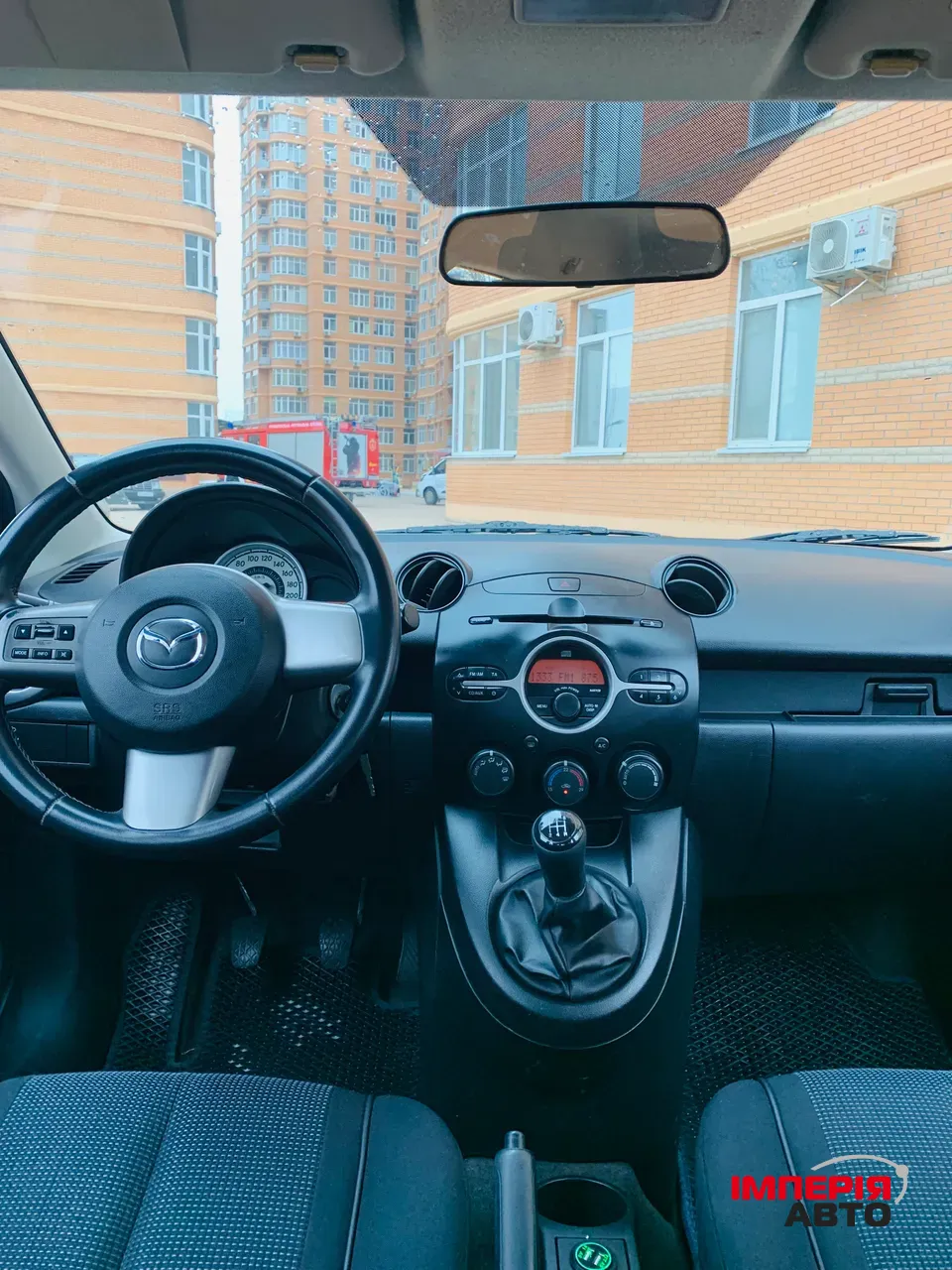 Mazda 2 - фото 10